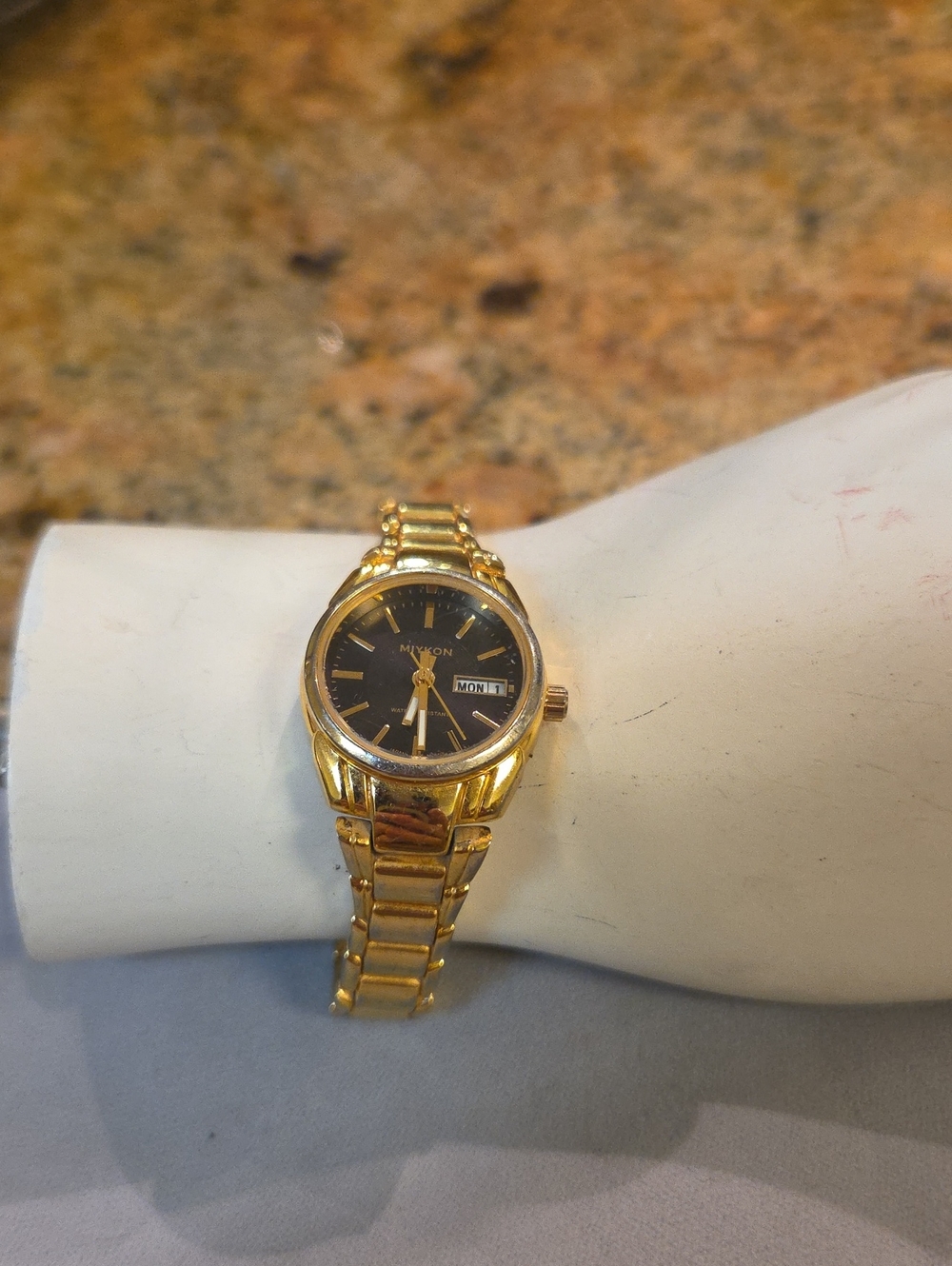 Miykon Gold Tone Wristwatch with Black Dial 6.5  In